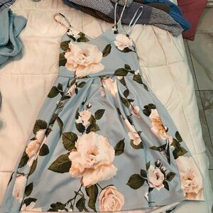 a baby blue with flowers dress